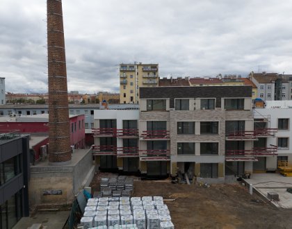 We completed plastering in 95 % of the apartments and poured floors in 50 % of the apartments